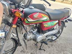 Honda CD 70 red color hai