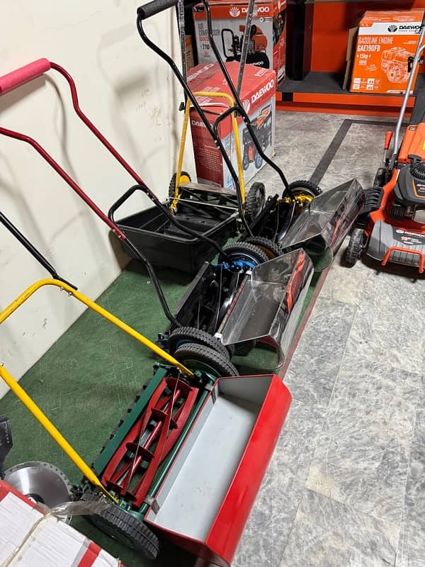 Home Ushttps://images. oe Lawn Mower Machine/ Manual Lawn Mower Machine 3