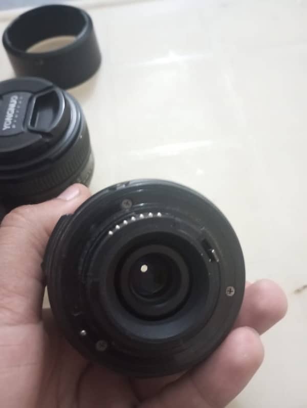 Nikon 50mm , Nikon 18:55 different prices 4