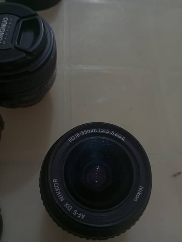 Nikon 50mm , Nikon 18:55 different prices 1