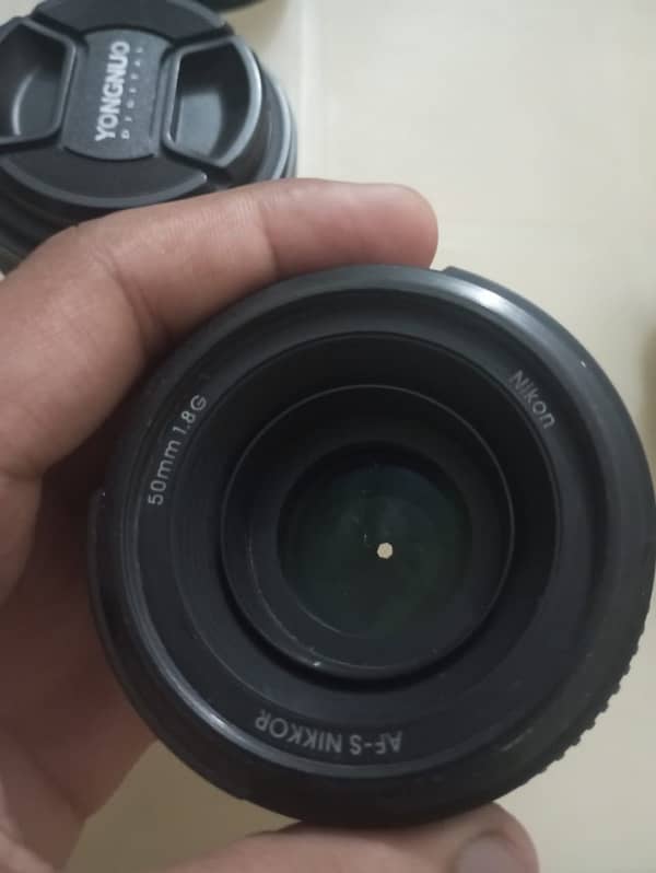 Nikon 50mm , Nikon 18:55 different prices 2