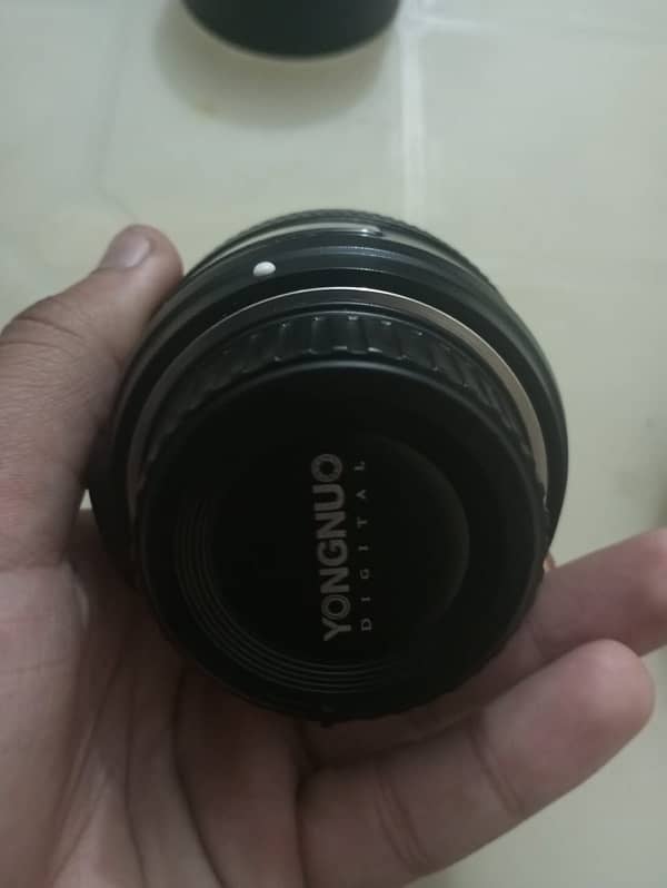Nikon 50mm , Nikon 18:55 different prices 10
