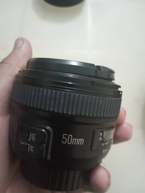 Nikon 50mm , Nikon 18:55 different prices 14