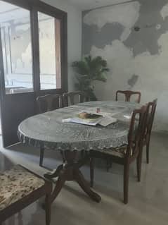 Dining table with 6 chairs for sale.