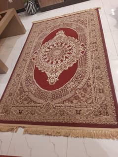 maroon and beige rug