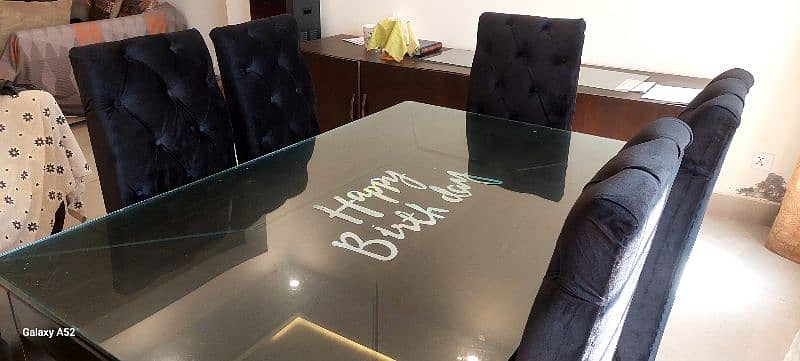 Modern Black wooden dining table with thick glass on top 1