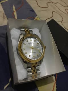 Rolex Daydate golden and silver New with Box