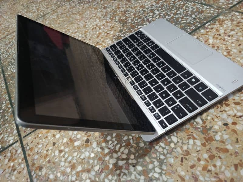 HP Revolve 810 g3 rotatable tablet mode corei5 5th gen 8gb ram 128 SSD 2