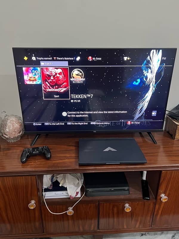 Playstation 4 slim 1TB with 2 original controllers and digital games 0