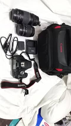 Canon 2000D EOS DSLR with 18-55mm lens and 75-300 mm lens