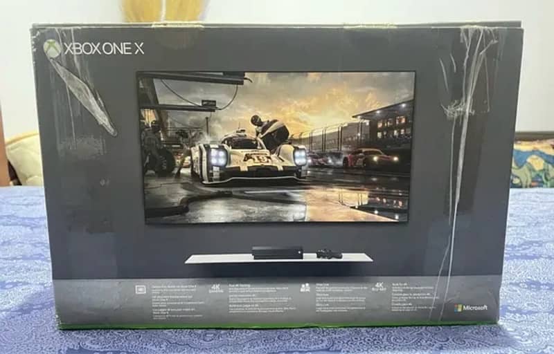 xbox one x 1 TB with Box Disc USA version 2