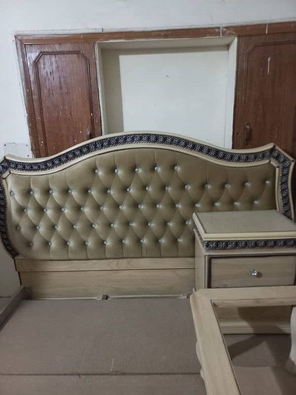 1x bed, 2x side tables, 1x showcase, 1 dressing table, 5x seater sofa 2