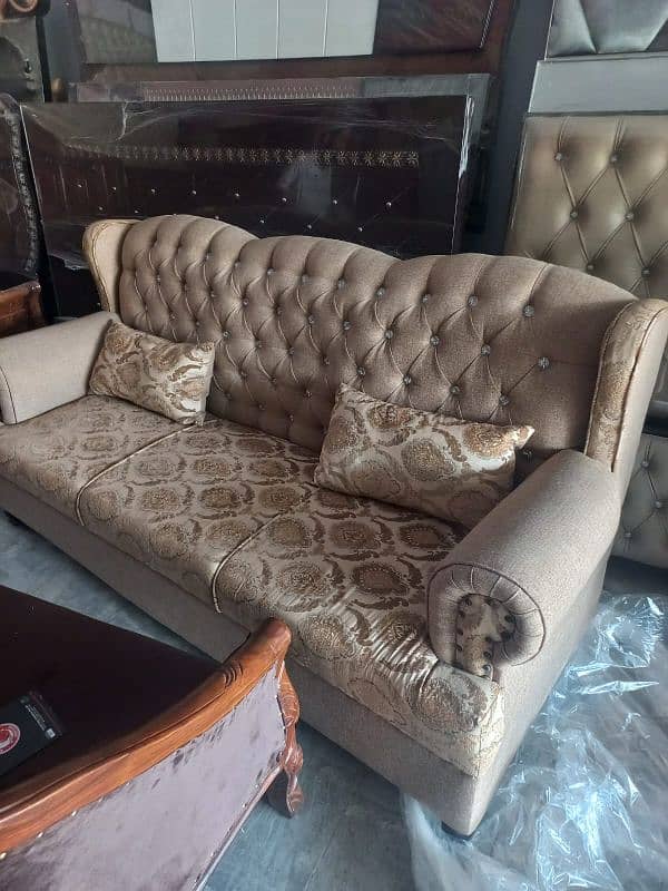 1x bed, 2x side tables, 1x showcase, 1 dressing table, 5x seater sofa 3
