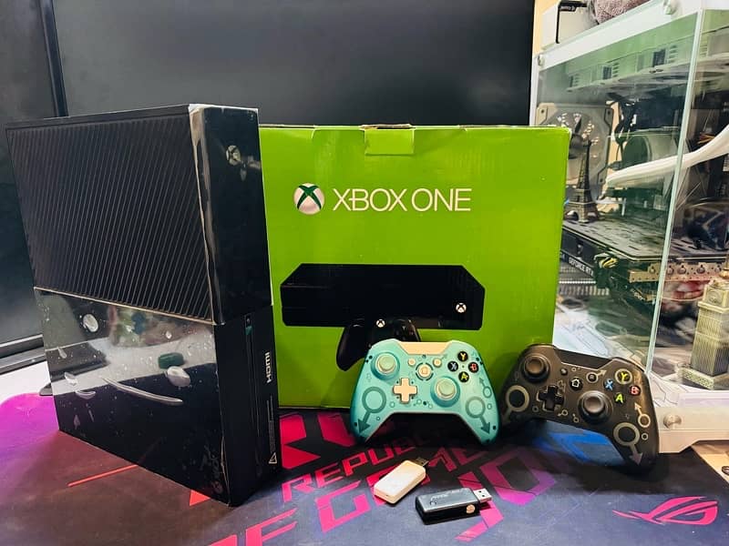 Xbox one brand New With Games 2 controllers 1