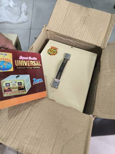 1 new universal 3000 watt stabilizer, 1 1200 watt used stabilizer