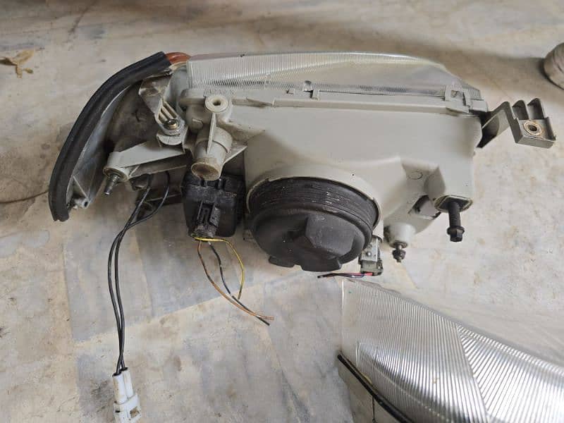 Suzuki Swift Cultus Adjustable Motorized Headlight 2