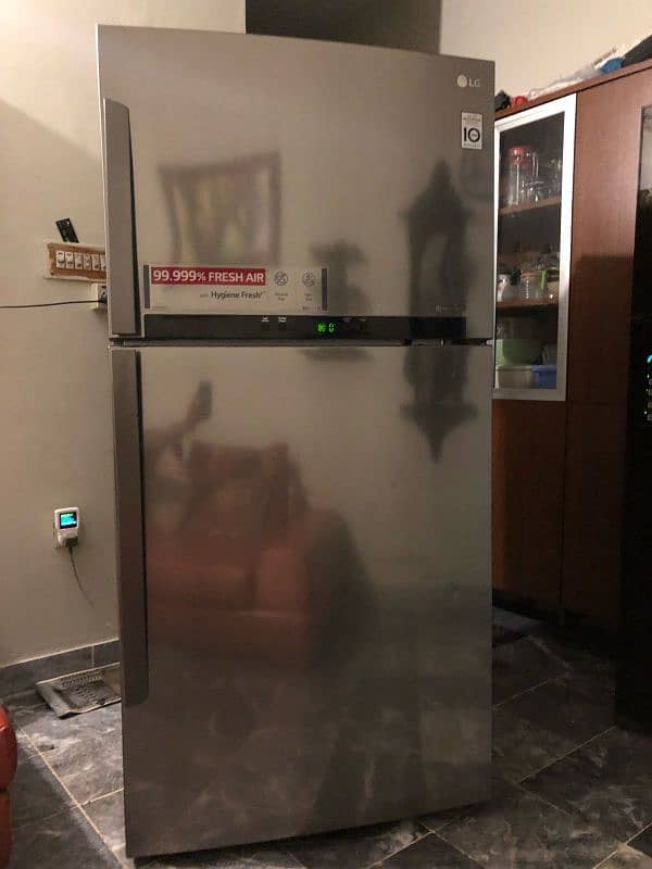 lg and Samsung Fridge two piece refrigerator full size invert with war 0