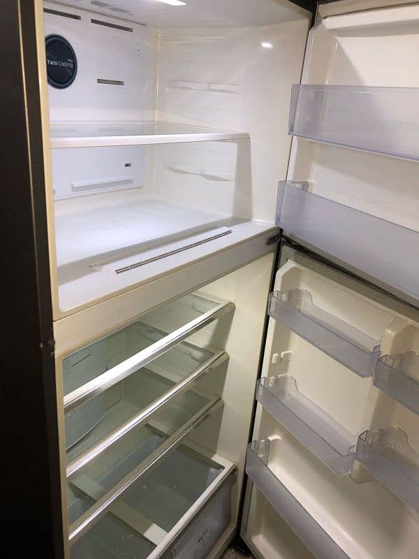 lg and Samsung Fridge two piece refrigerator full size invert with war 4
