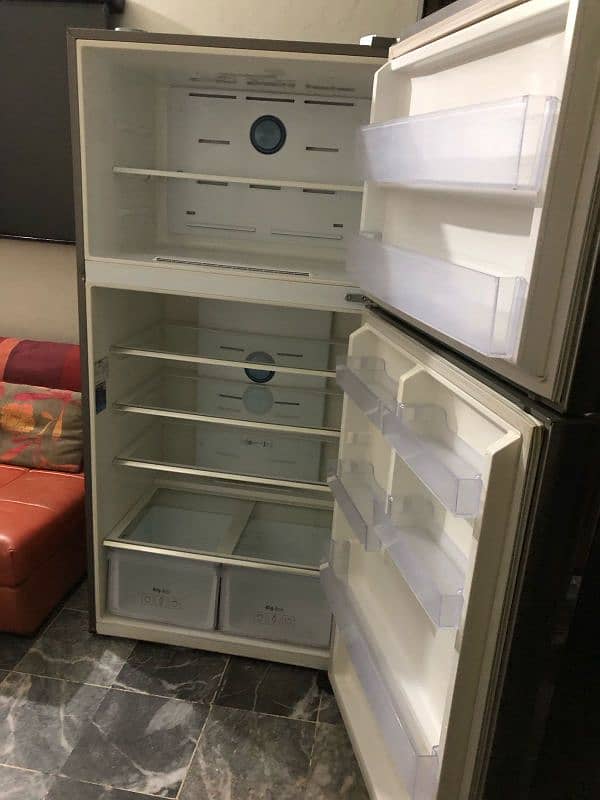 lg and Samsung Fridge two piece refrigerator full size invert with war 5