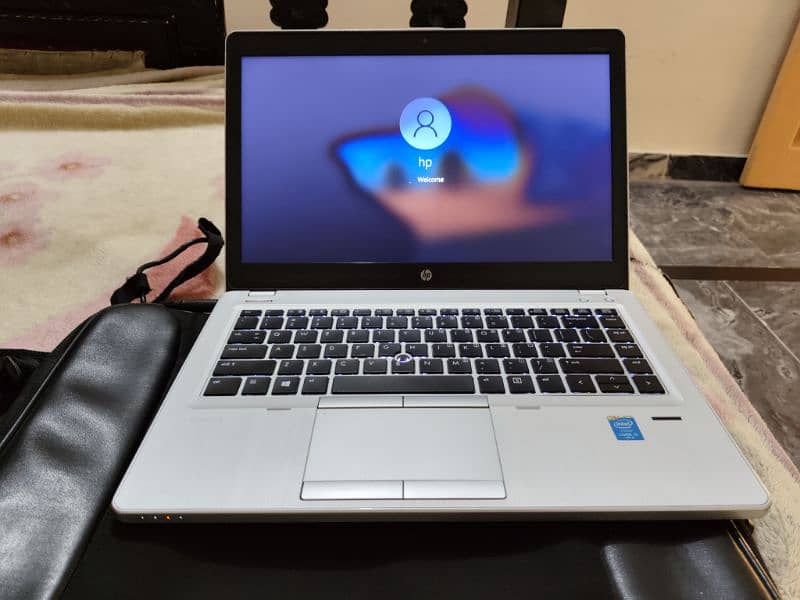 Hp Folio 9480p. Beautiful Slim Book 1