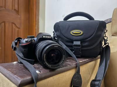 Nikon D3200 with 18-55mm Lens + Bag & Charger – Perfect Condition!