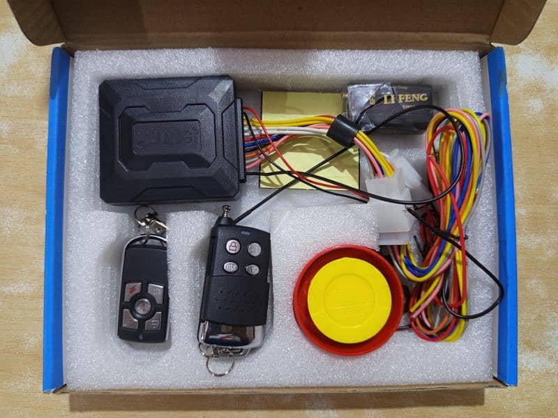 Anti Theft Alarm System for Motorcycle w 2 Key set, Remote Self Start 1