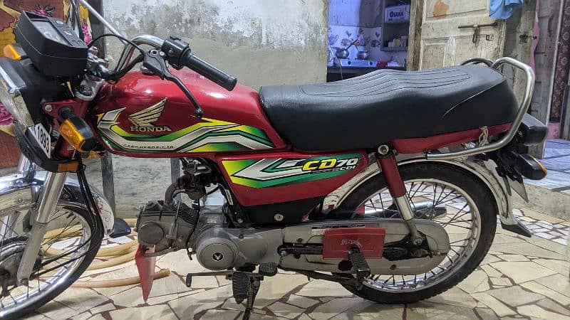 Honda CD 70 - 2023 model - red color 1