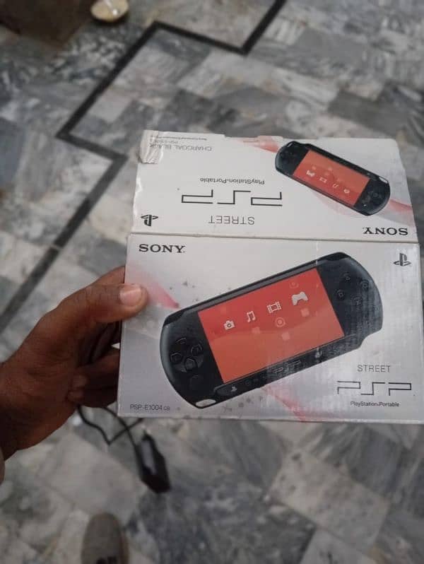 Sony PlayStation Portable (PSP) Street, a handheld gaming console. 5
