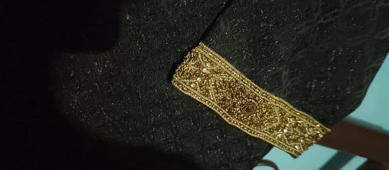 Groom's sherwani with khoosas. 2