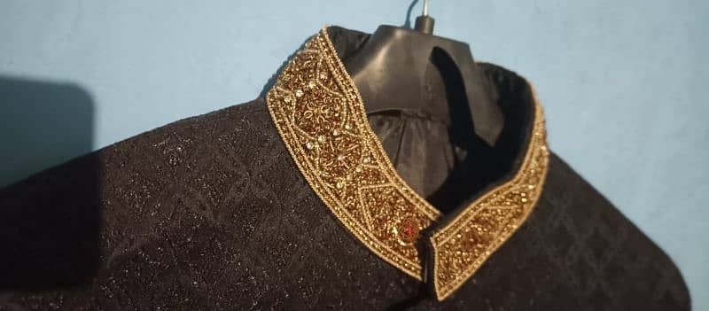 Groom's sherwani with khoosas. 4