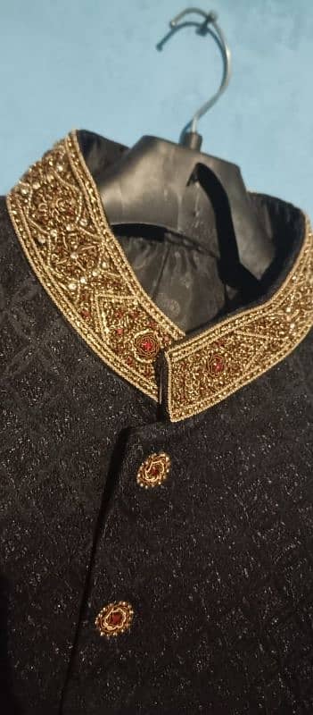 Groom's sherwani with khoosas. 5