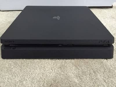 ps4 slim slightly used with 7 games three controller