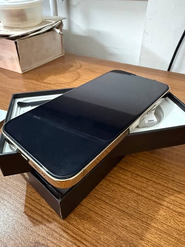 iphone 13 pro max 128gb golden like new. factory unlock and pta approv 0