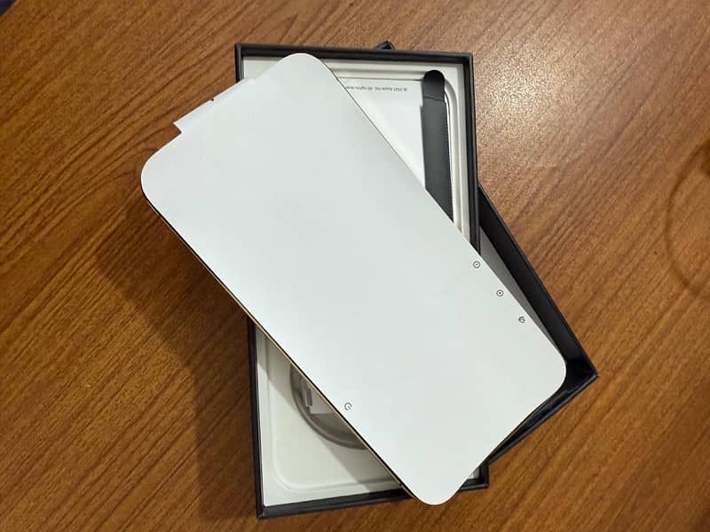 iphone 13 pro max 128gb golden like new. factory unlock and pta approv 7