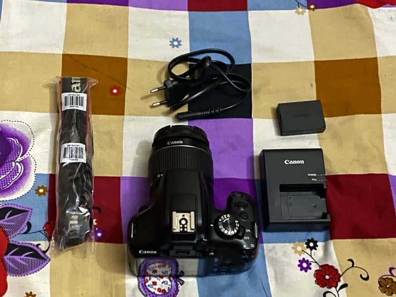Canon 1300d wifi dslr with 18-55mm lens Full box and all accessories. 1