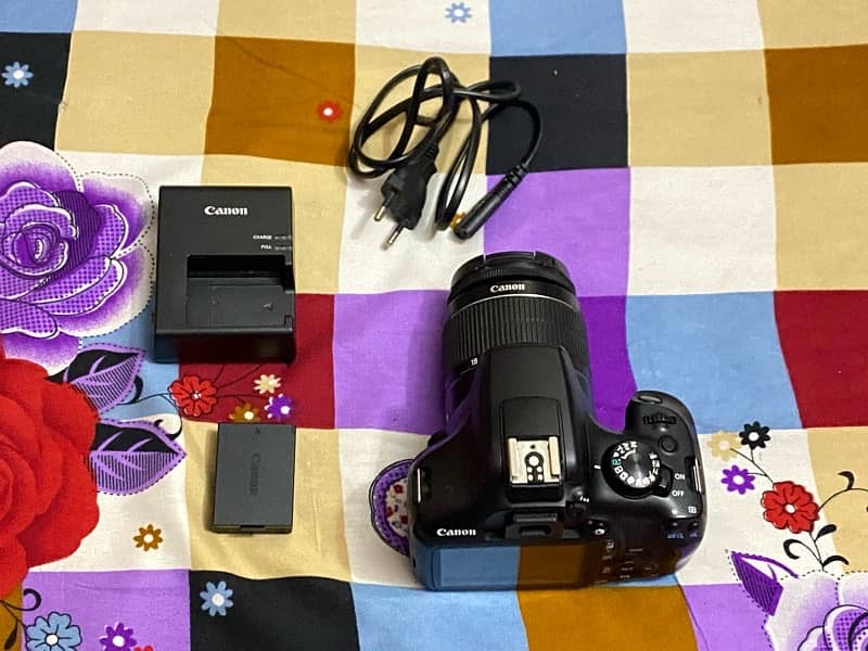 Canon 1300d wifi dslr with 18-55mm lens Full box and all accessories. 2