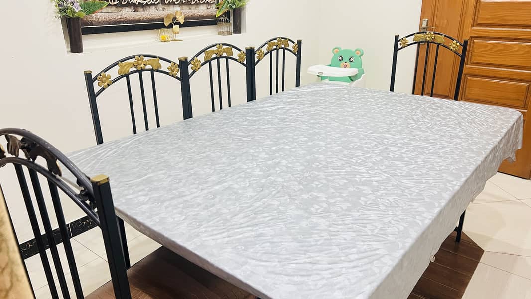8 seater Dining table steel material with mirror 5