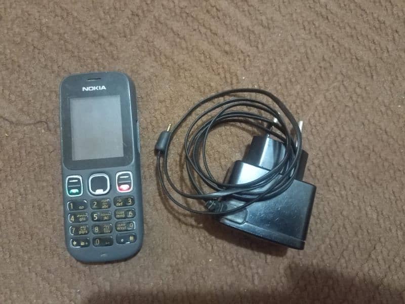 Nokia 101 Original with charger 0
