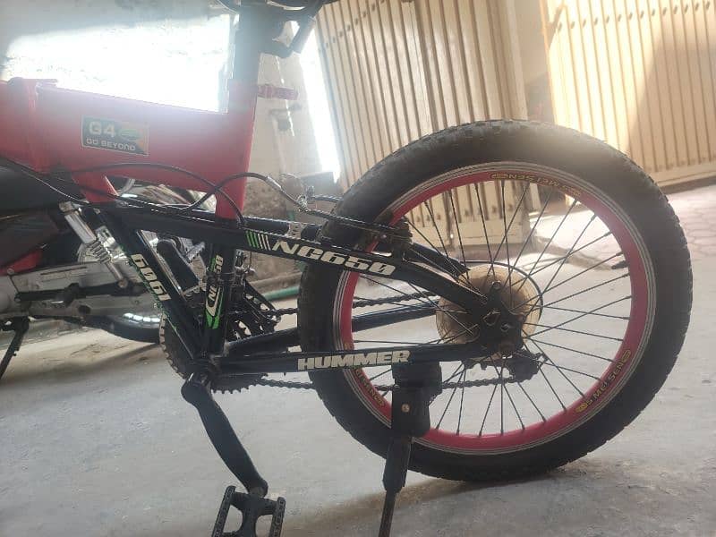 Folding and gear bicycle 10
