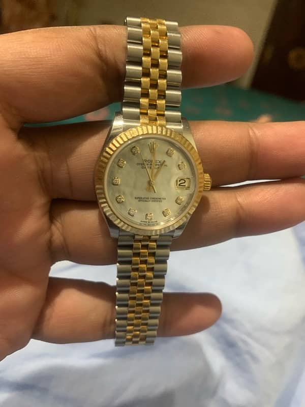 Rolex 31 mm Mother of Pearl Daimond 8