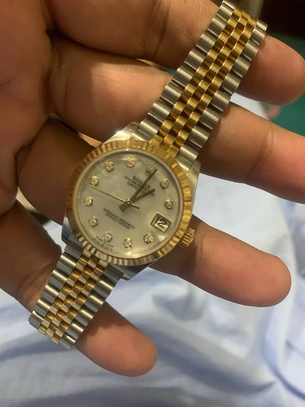 Rolex 31 mm Mother of Pearl Daimond 9