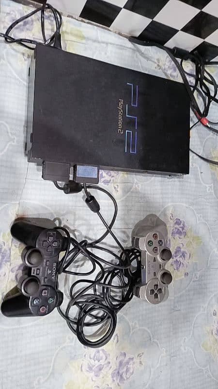 ORIGINAL SONY PLAYSTATION 2 WITH TWO MEMORY CARDS AND TWO CONTROLLERS 0