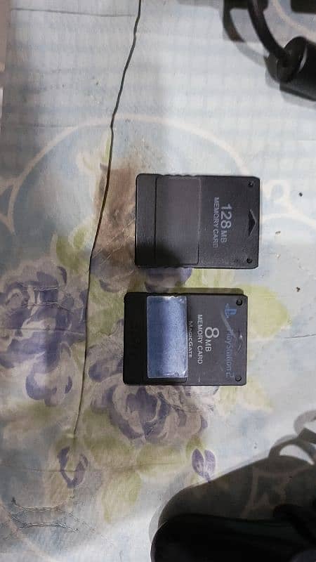 ORIGINAL SONY PLAYSTATION 2 WITH TWO MEMORY CARDS AND TWO CONTROLLERS 4