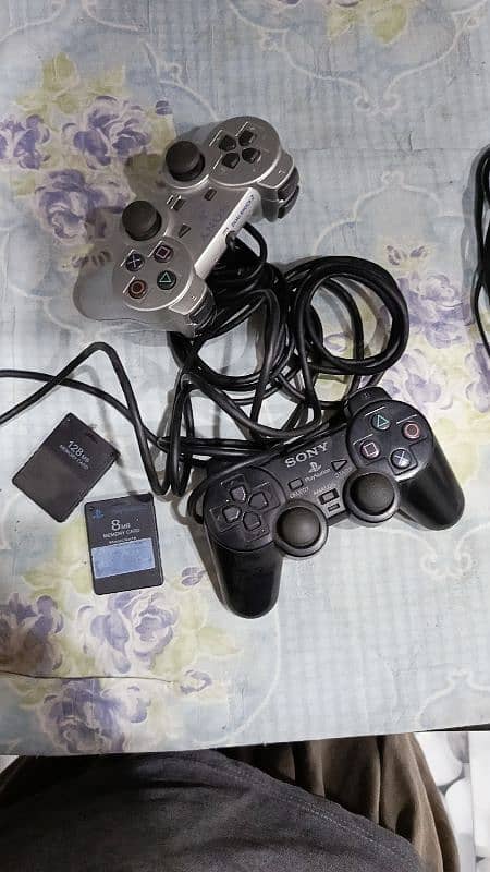 ORIGINAL SONY PLAYSTATION 2 WITH TWO MEMORY CARDS AND TWO CONTROLLERS 7