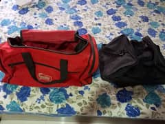 Two Canvas Duffle Bags