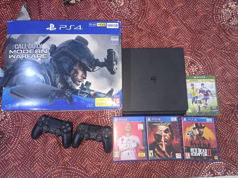 PS4 500GB. . with two controllers and 3 ps4 Cds and 1 Xbox CD 0