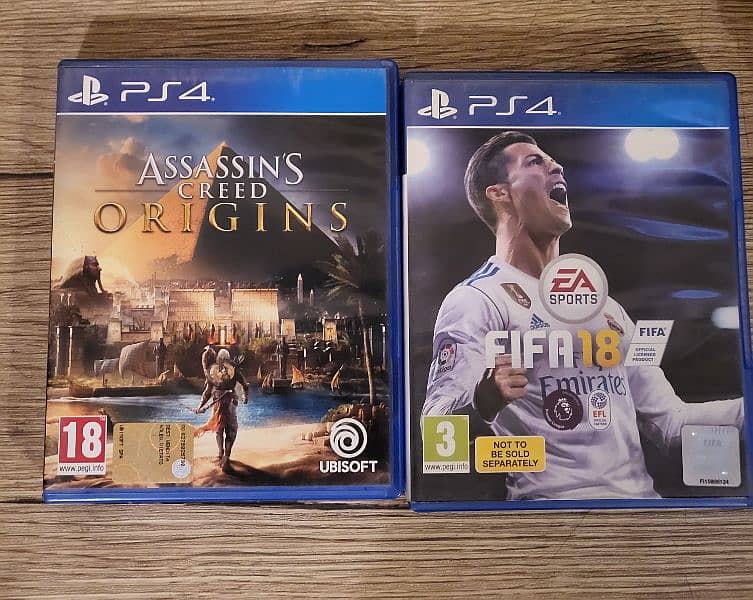 PLAYSTATION 4 SLIM 1TB with box & 4 controller. FIFA 18 & Assassin's C 3