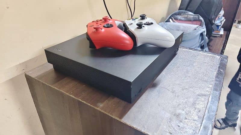 Xbox one x bundle for sale. Comes with two controllers 3
