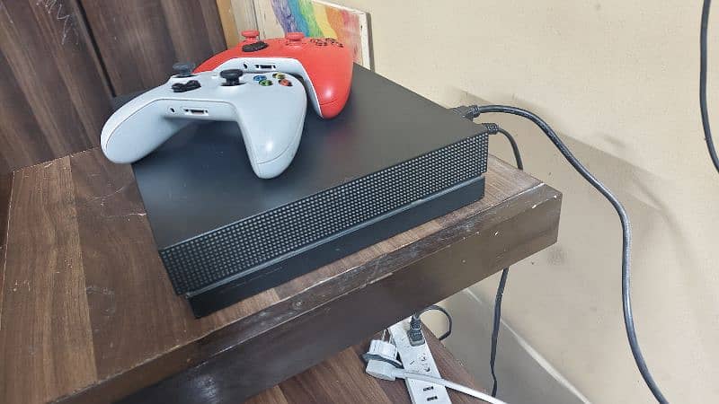 Xbox one x bundle for sale. Comes with two controllers 4