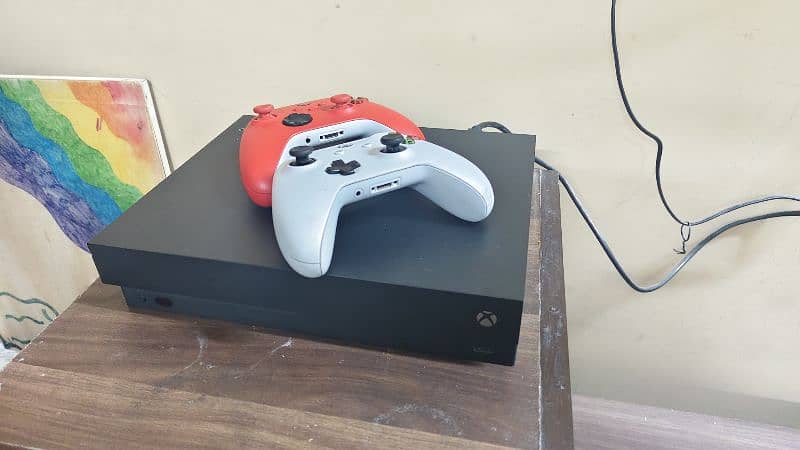 Xbox one x bundle for sale. Comes with two controllers 5